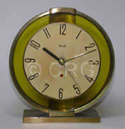 Westclox tan green glass in brass frame clock