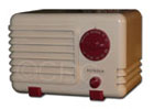 Detrola Radio model 197 PeeWee with white plaskon cabinet and red knobs and feet, 1939
